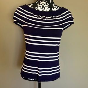 Navy striped sleeveless knit top with double ruffle over neckline.